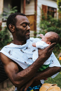 Father with newborn baby