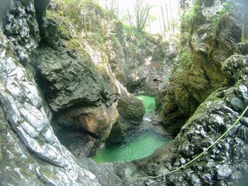 High angle view of waterfall on riverbank