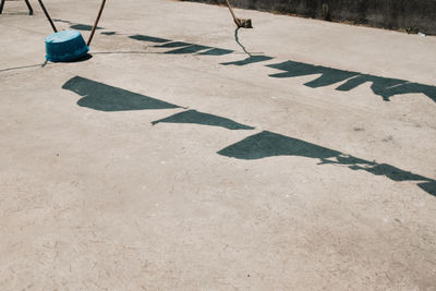 Shadow of clothes on street