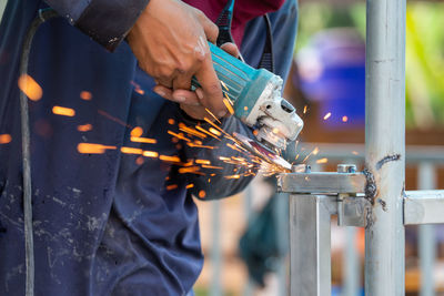 Man working on metal structure