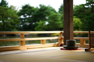 Containers on tatami mat in gazebo at park