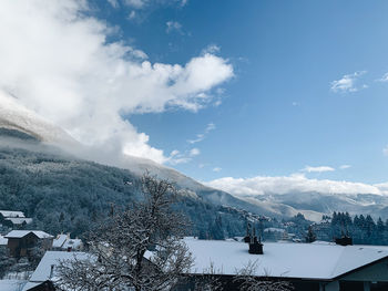 Scenic view of snowcapped mountains against sky