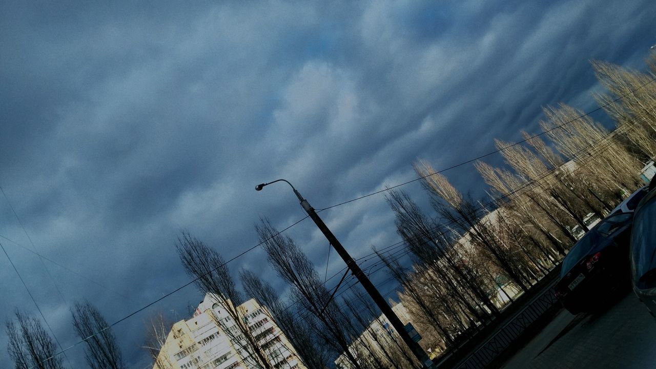 LOW ANGLE VIEW OF BLUE SKY OVER CITY