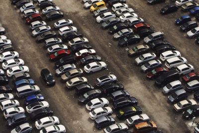 High angle view of cars parked at parking lot