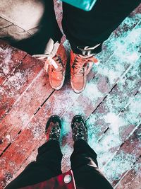 Low section of people standing on floor