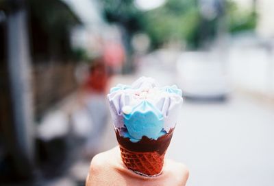 Hand holding ice cream