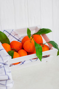 Close-up of orange fruits on table