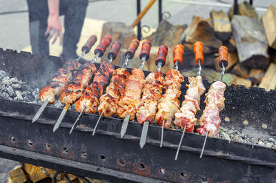 Skewers with meat on coals. cooking kebabs. appetizing delicious food