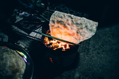 High angle view of meat on barbecue grill