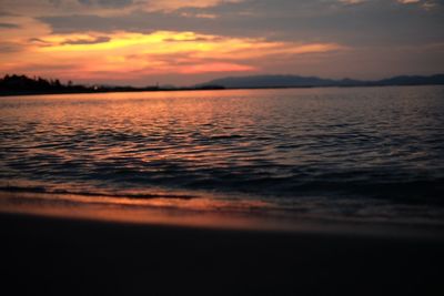 Scenic view of sea at sunset