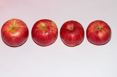 Directly above shot of apples against white background