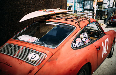 Close-up of vintage car on street