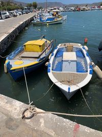 High angle view of boats moored at harbor