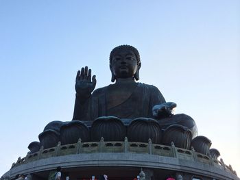 Low angle view of statue against clear sky