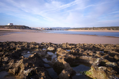 Scenic view of beach against sky