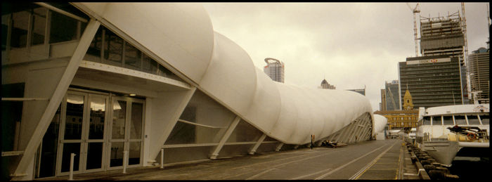 Modern buildings in city against sky