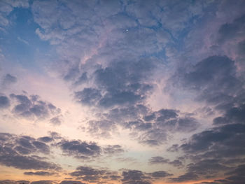 Low angle view of clouds in sky during sunset