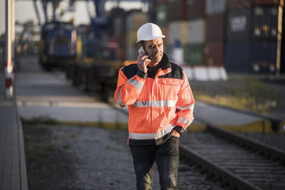 Man working on road in city