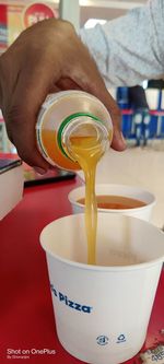 Close-up of person holding tea cup