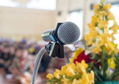 Close-up of microphone against flowers