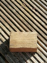 High angle view of wooden bench