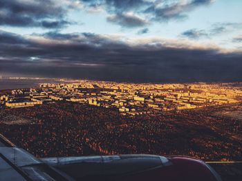 Aerial view of landscape against sky during sunset