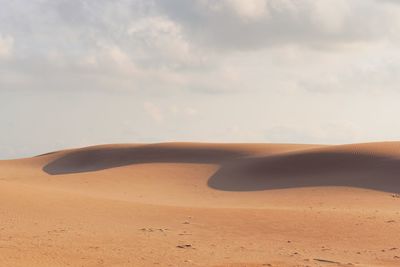 Scenic view of desert against sky