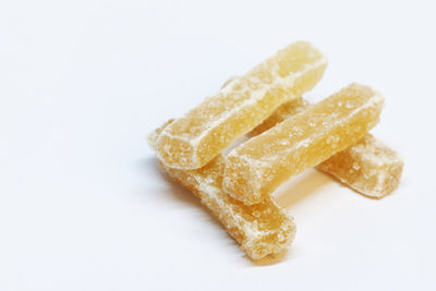 Close-up of cake against white background