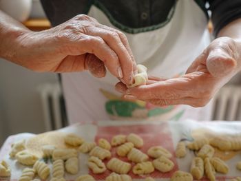 Close-up of man preparing food