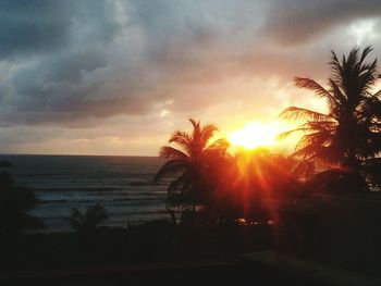 Scenic view of sea at sunset