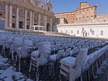 Chairs in front of historical building