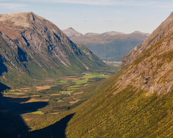 Massive mountain range with rock and forest