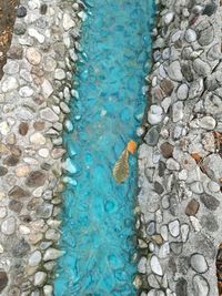 High angle view of stones in swimming pool