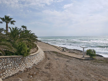 Scenic view of beach against sky