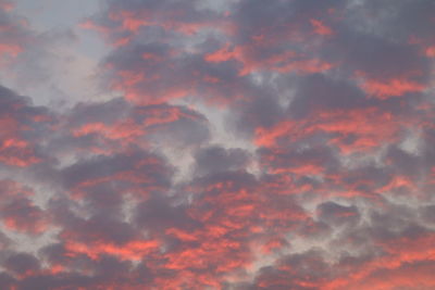 Low angle view of dramatic sky during sunset