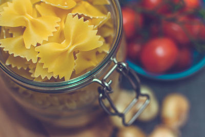 Close-up of raw pasta in jar