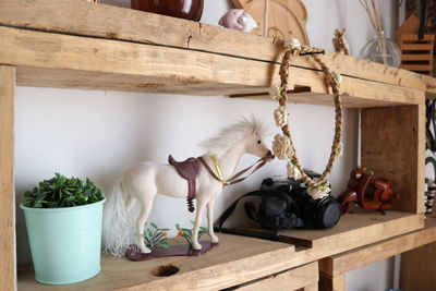 Cat sitting on table at home