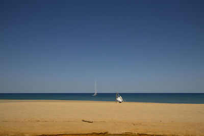 Landscape view of piscinas beach with a sail and tourist