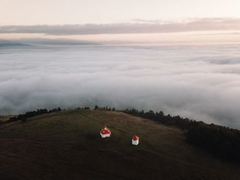 Scenic view of field against sky during sunset