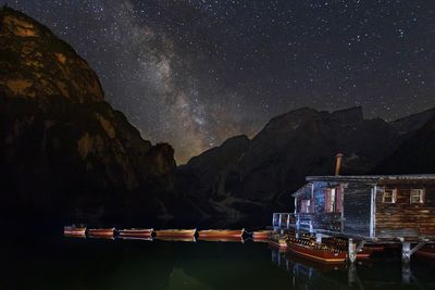 Scenic view of mountains against sky at night
