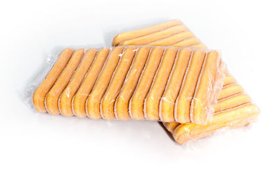 High angle view of bread against white background