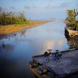 High angle view of bicycle on riverbank