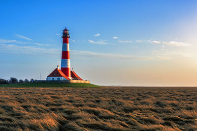 Westerheversand lighthouse on the north sea a landmark of the eiderstedt peninsula in germany.