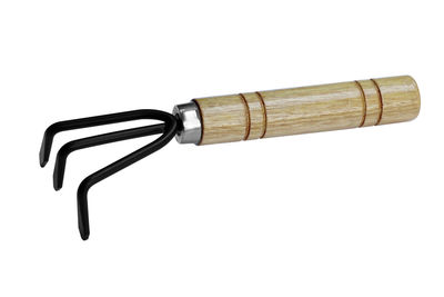 Close-up of machine part against white background