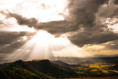 Sunlight streaming through clouds over biblical landscape in ethiopia 