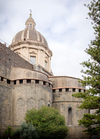 Low angle view of historical building against sky