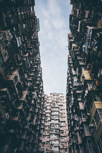 Low angle view of buildings in city against sky