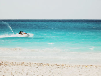 Scenic view of sea against clear sky