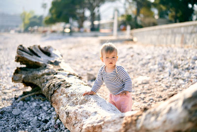 Boy on rock