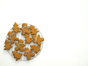 High angle view of cookies on white background